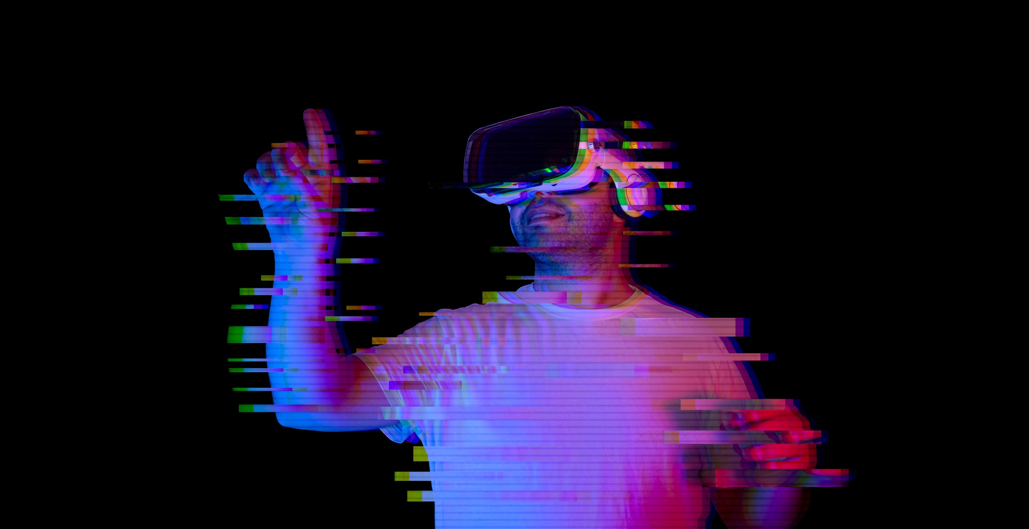 young-man-using-vr-glasses-with-glitch-effect-new-virtual-world-metaverse.jpg